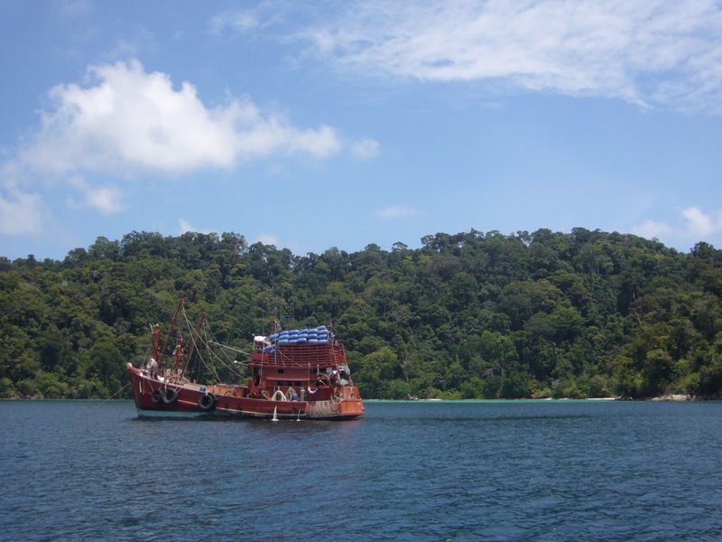 Fishing boats between two islands.
